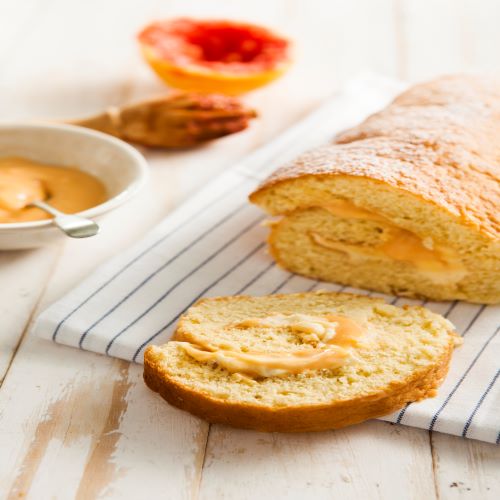 Swiss roll with zesty grapefruit curd